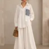 Élégance Equestre Céléria – chemise blanche à poche tweed et pantalon large, vue de face